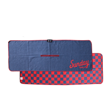 Front and back view of red and navy checkered tailgate golf towel